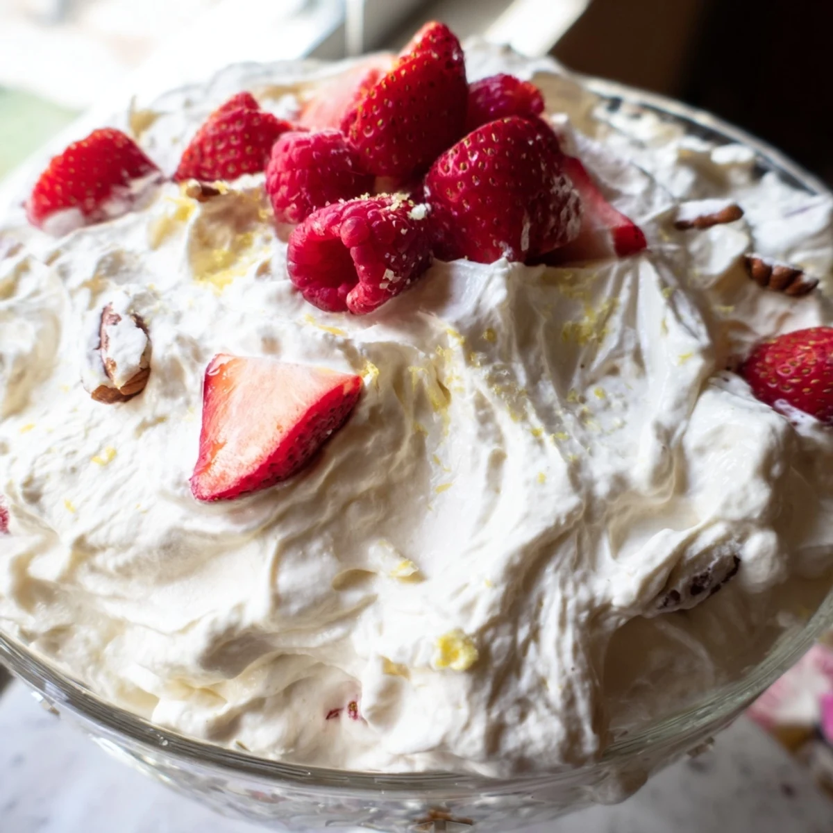 Light and airy keto cheesecake fluff swirled with vanilla in dessert glasses