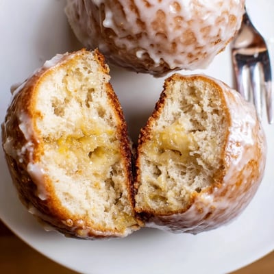 Glazed Banana Donuts on a wire rack, perfect for cozy breakfast