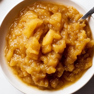 Slice of toast topped with Fall Caramel Apple Jam, warm cinnamon aroma